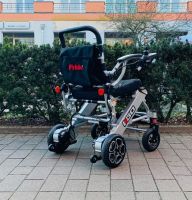Vorschau: Pride I-Go (6 km/h) silber, Vorführ - Reise-Elektrorollstuhl Vorschau: Pride I-Go (6 km/h) silber, Vorführ - Reise-Elektrorollstuhl