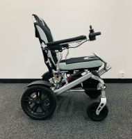 Vorschau: AX Power Pro C1 Ultralight (6km/h) - klappbarer Elektrorollstuhl Seite Vorschau: AX Power Pro C1 Ultralight (6km/h) - klappbarer Elektrorollstuhl Seite