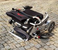 Vorschau: Elektro-Reise-Rollstuhl R-GO (6 km/h) silber, neuwertig Vorschau: Elektro-Reise-Rollstuhl R-GO (6 km/h) silber, neuwertig