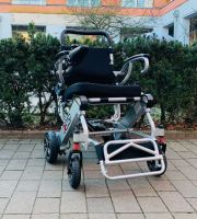 Vorschau: Pride I-Go (6 km/h) silber, Vorführ - Reise-Elektrorollstuhl Vorschau: Pride I-Go (6 km/h) silber, Vorführ - Reise-Elektrorollstuhl