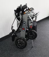 Vorschau: Elektro-Reise-Rollstuhl R-GO (6 km/h) silber, neuwertig Vorschau: Elektro-Reise-Rollstuhl R-GO (6 km/h) silber, neuwertig