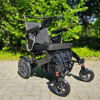 Vorschau: McFoldy Black C1 Frontansicht rechts Fussbrett hochgeklappt Vorschau: McFoldy Black C1 Frontansicht rechts Fussbrett hochgeklappt