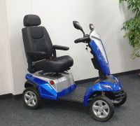 Vorschau: KYMCO Texel (15 km/h) blau - Gebrauchtes Elektromobil seitliche Ansicht Vorschau: KYMCO Texel (15 km/h) blau - Gebrauchtes Elektromobil seitliche Ansicht