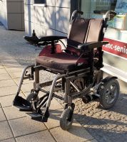 KYMCO McFoldy (6 km/h) Bronze – Neuwertiger Elektrorollstuhl KYMCO McFoldy (6 km/h) Bronze – Neuwertiger Elektrorollstuhl
