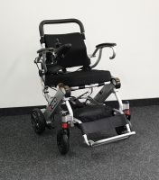 Vorschau: Elektro-Reise-Rollstuhl R-GO (6 km/h) silber - Neuwertiger Elektrorollstuhl Vorschau: Elektro-Reise-Rollstuhl R-GO (6 km/h) silber - Neuwertiger Elektrorollstuhl